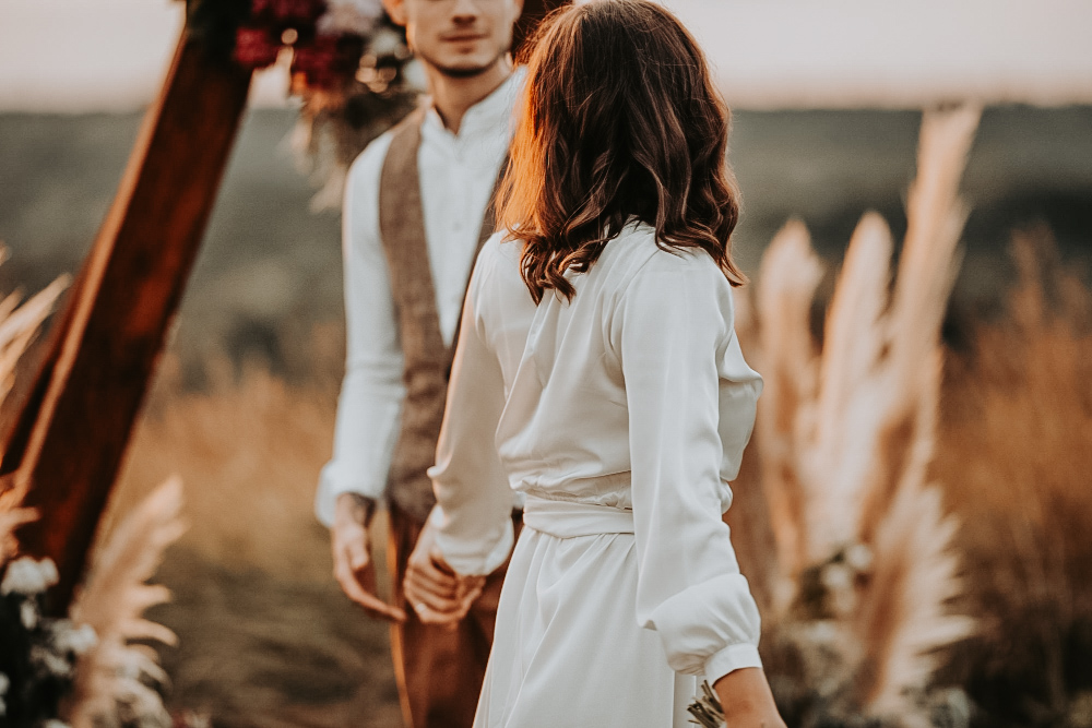 Couple planning their wedding with a checklist